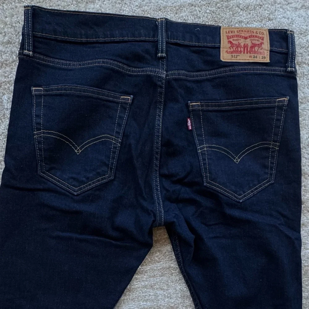Levi's Men's Dark Indigo Slim Straight Jeans  W 34/ L 27.5